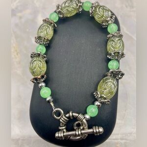 Green and Ornate Silver Beaded Bracelet with Toggle Closure. 8 inches